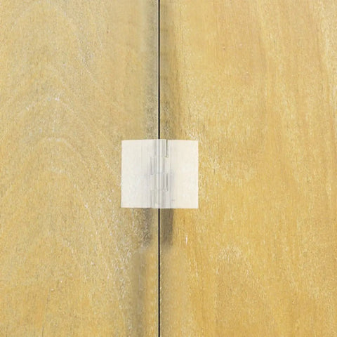 Clear Self Adhesive Folding Hinge Set, Acrylic 20 Pack on wooden surface, showing transparent and flexible design for cabinets
