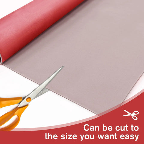 Red Micro Suede Headliner Fabric With Foam Backing And Flame Retardant For Car being cut with orange scissors