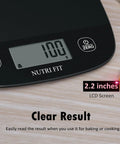 Close-up of Ultra Slim Digital Kitchen Scale with 2.2-inch LCD screen displaying weight, black, for precise food weighing.