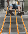 Light Duty Conveyor With ABS Roller System For Unpowered Spliced Truck Trailer Use In Warehouses Bucket Line Unloader 100 Cm Length 12 Inch Wide 30 Cm Frame Extendable Up To 300 Cm For The Warehouse Crew A Real Workhorse, shown with worker seated