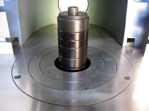 Close-up of interchangeable spindle on 5HP Single Phase Woodworking Router Table With Cast Iron Surface Precision Ground Table Pre Drilled Holes For Optional Power Feeder Beefy Cabinet Stand With Wheels And Locks One And A Quarter Inch Interchangeable Spindle Included