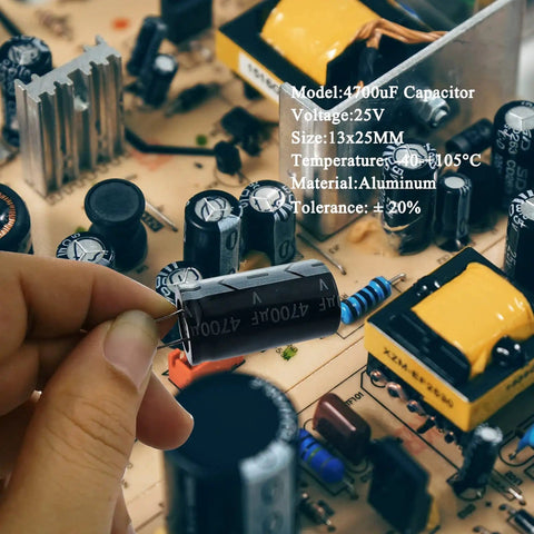 Hand holding 4700uF 25V capacitor on circuit board for DIY soldering, Arduino projects, electronics repair, rated high temp, 16x25mm.
