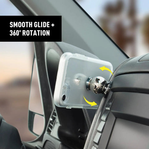 Phone attached to Steelie Magnetic Dash Mount Ball For Phone Mounting System Extra Car Dash Mount Accessory on vehicle dashboard.