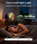 Woman sleeping with Portable Misting Clip On Fan With USB C Rechargeable Battery on night stand, providing quiet cooling.