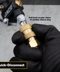 Close-up of brass 1/4 in NPT air quick-connect plug and coupler with knurled sleeve being pulled back.
