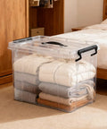 Big Boss 90 Quart Clear Plastic Storage Bins 8 Pack With Snap On Lids heavy duty jumbo tote holding neatly folded blankets.