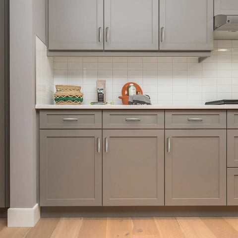 Modern kitchen featuring 60 Pack Solid 3-3/4 Inch Cabinet Handles In Brushed Nickel Or Satin Nickel, 4-1/4 Inch Overall Length pulls on drawers.