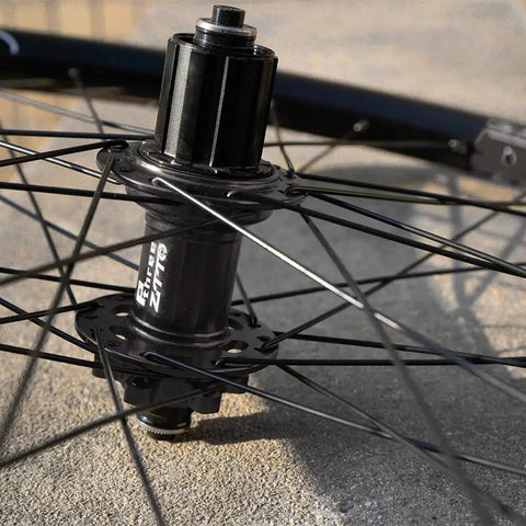 Close-up of rear wheel hub from All Terrain Mountain Bike Wheelset For 29, 27, And 26 Inch Rims, 135 QR, 142 Thru Axle