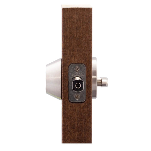 Side view of Satin Stainless Single Cylinder Deadbolt With ANSI Grade 3 Security installed on a wooden door showing turn piece and cylinder guard.
