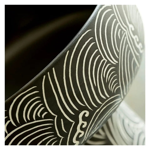 Close-up view of the intricate patterns on the Hella Smooth Floor Standing Ceramic Vessel Sink with Top Shelf.