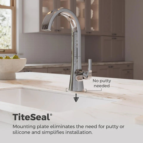Pfister Vaneri Kitchen Faucet with Pull Down Sprayer, Polished Chrome showcasing sleek design and high arc spout in a kitchen setting.