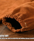 Elastic cuff detail of Leather Welding Sleeve For Men And Women, Heat And Flame Resistant Arm Protection With Kevlar Stitching, Brown.