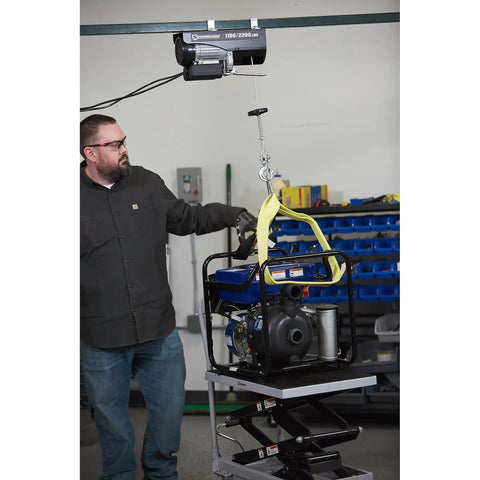 Strongway 1100 Lb Electric Cable Hoist With 2200 Lb Double Line Capacity For Garage Use features overhead lifting of an engine.