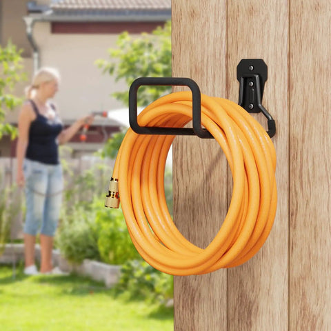 Heavy Duty Garden Hose Holder Wall Mount Built Tough Steel Hose Hanger with orange hose on wooden wall outside