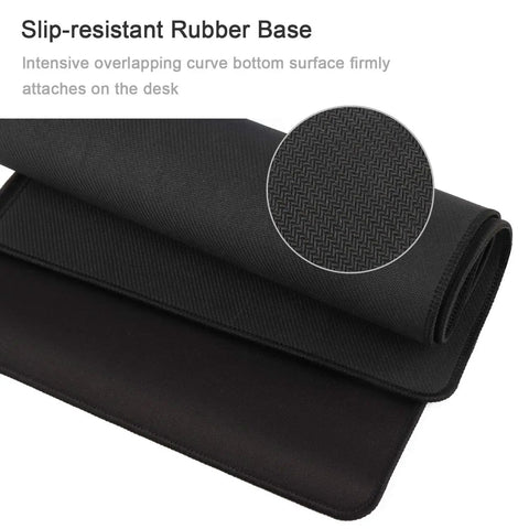 Close-up of Ultra Large Gaming Mouse Pad XXL 23.6 By 11.8 Inches with non-slip rubber base for stable grip on desk surface.