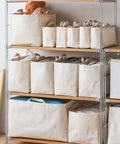 Slim Fabric Storage Bins With Comfort Handles Narrow Closet Organizers For Shelf And Cabinet Durable Canvas Containers stacked on wooden shelves.