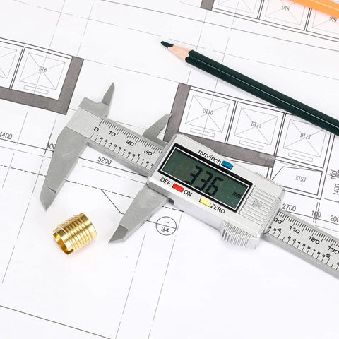 Go-To Digital Caliper With LCD Display 0 To 6 Inch Range measuring hardware on blueprint with pencil