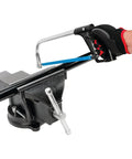 Hammer Tough 8 Inch Bench Vise With Powder Coated Finish, 360 Degree Swivel Base in use with hand saw, workshop setting.