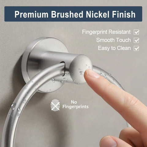 Close-up of brushed nickel towel ring stainless steel round bath holder with finger showing rustproof durable finish