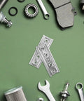Heavy Duty Hidden Headboard Wall Mount Brackets For Sofa And Couch Sections With Solid Silver Metal Connectors laid on a green background.