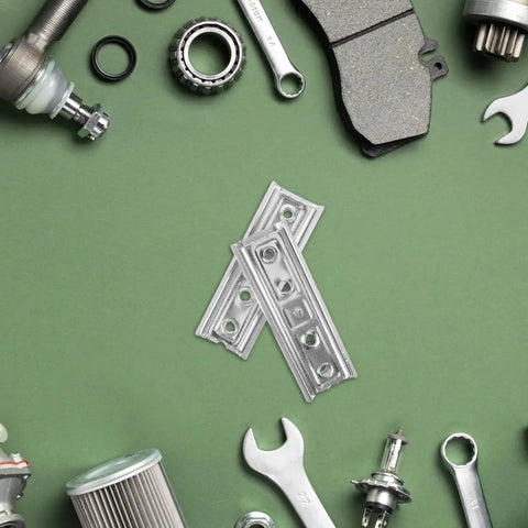 Heavy Duty Hidden Headboard Wall Mount Brackets For Sofa And Couch Sections With Solid Silver Metal Connectors laid on a green background.