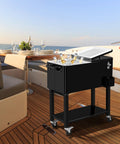 Portable Bar On Wheels With Ice Chest And Built In Shelf for Patio Parties and Backyard BBQs shown on a boat deck