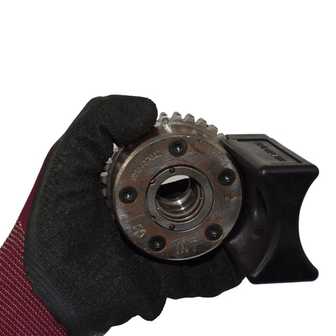 Gloved hand holding part of 3.6L Pentastar Timing Tool Kit For Camshaft Holding And Chain Lock Pro Grade Easy Install Glass Fiber Nylon Build