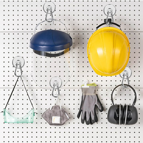 Bad Boy Magnetic Carabiner Hooks holding safety gear like helmets and gloves on a pegboard wall, 12 pack stainless steel magnets.