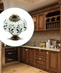 Ivory Pumpkin Ceramic Cabinet Knobs Set 12 Piece Vintage Leaf Pattern in rustic kitchen setting with wooden cabinets