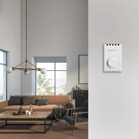 Interior view showing Manual 4 Wire Line Voltage Baseboard Thermostat For Electric Heaters No Frills, mounted on wall