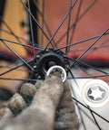 Close-up of a bicycle wheel assembly with Internal Tooth Star Lock Washers Kit Pack With 258 Pieces In 8 Sizes M2.5 To M12 304.