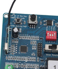 Close-up of Sliding Gate Opener Main Board With Remote Controllers, showing control elements on a blue circuit board.