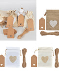 Assorted Burlap Jewelry Pouches Set Of 51 Small Gift Bags with heart design, tags, and rope shown for wedding or special occasions use.