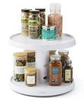 Game Changer Two Tier Height Adjustable Lazy Susan Turntable With Smooth 360 Swivel For Kitchen Cabinet And Pantry Organization And Quick Access Storage In White displaying spices and herbs.