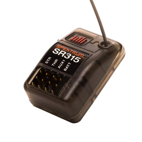 Close-up of SR315 3 Channel 2.4GHz DSMR RC Sport Receiver for surface RC cars, showing durable hard case and binding button.