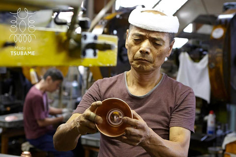 Artisan crafting a component for Tsubame WDS185 Stainless Steel Coffee Dripper, showcasing precision in Japanese manufacturing.