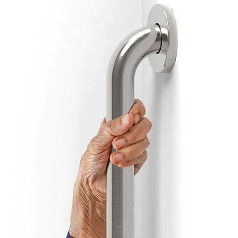 Senior hand holding Two Pack Stainless Steel Bath Safety Grab Bars One And A Quarter Inch By Twelve Inch ADA Compliant Heavy Duty 500 Pound Support Oil Rubbed Bronze For Bathroom Shower Tub And Home Safety mounted on wall