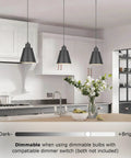 Top Tier Matte Black 3 Pack Pendant Lights For Kitchen Island over a modern kitchen island with adjustable height.