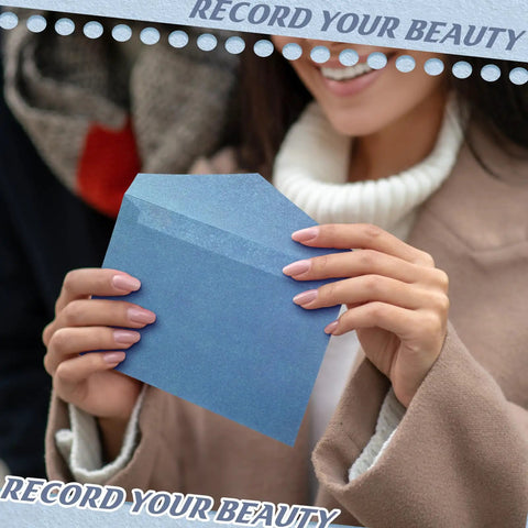 Person holding blue envelope from All In One Blue Letter Writing Paper And Envelope Set With 50 Lined Papers 50 Envelopes And 50 Stickers