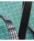 Pro Level No Stress Replacement 6 Rib 370J Drive Belt 2 Pack on green cutting mat showing ribbed design for various machines