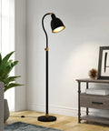 Adjustable Arc Floor Lamp With Metal Shade In Blackened Bronze Finish in living room with side table and decor, 8 ft cord visible