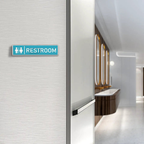 Clear Acrylic Door Name Plates 2x8 Inches 5 Pack With Adhesive Tape Easy Paper Insertion For Office And Classroom Doors Wall Mount Or Horizontal Sign Frame shown as restroom sign on a wall near restrooms