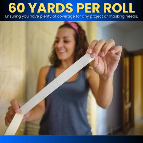 Person holding Beige Painter Tape For Crisp Lines And Trim, 0.7 Inch By 60 Yards, Thin Low Residue Masking Tape indoors.