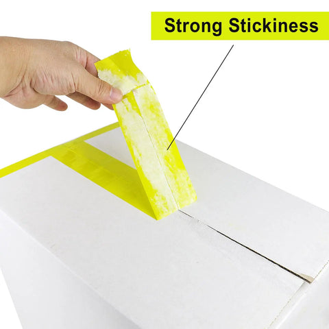 Heavy Duty Light Yellow Packing Tape Refills, 2.5 Mil Thick, sealing a box, showing strong adhesion