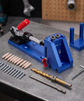 Heavy Duty Pocket Hole Jig Kit With Built In Clamp Adjustable For Board Thickness Woodworking Tool Perfect For Amateur Crafters And Cabinet Makers Who Need Strong Seamless Joints Every Time. Blue metal jig kit with clamp, drill bit, screws, plugs, and hex key