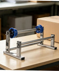 Manual Stretch Film Dispenser Stand For Shipping Supplies Hand Operated Wrap Film Holder With Metal And Plastic Construction Lightweight Yet Sturdy For Easy Desktop Wrapping And Efficient Warehouse Or Home Packing, on desk