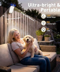 Clip On Solar Lights 4 Pack With 60 LED 500LM Motion Sensor USB And Solar Powered Waterproof Security Lights for deck illuminating woman with dog