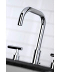 Manhattan Widespread Bathroom Faucet With Pop Up Drain In Polished Chrome, Solid Brass Construction, shown in close-up view.