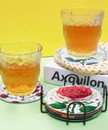 Diamond Art Coasters Kit For Adults Eight Piece Rose Diamond Painting Coaster Set With Holder shown with glasses on coasters.