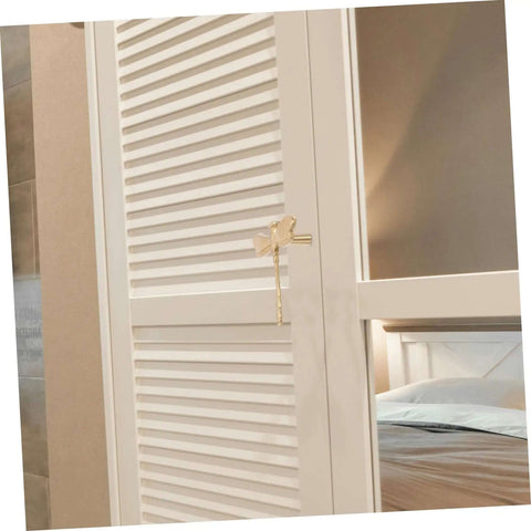 Dope Antiqued Brass Dragonfly Cabinet Knobs With Slick Pull Action For Kitchen Cabinets And Drawer Fronts Built Different Hardware on white cabinet door.